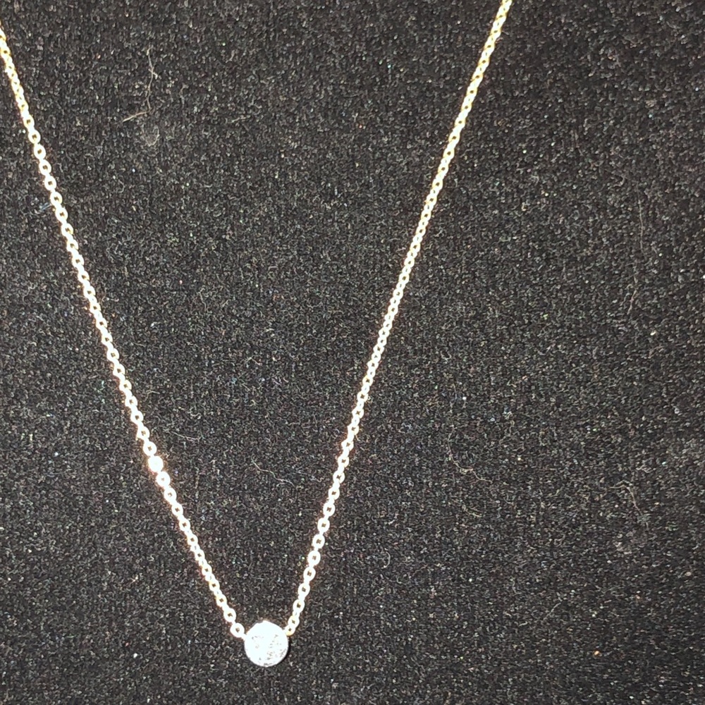 Gold and silver colored small disc necklace